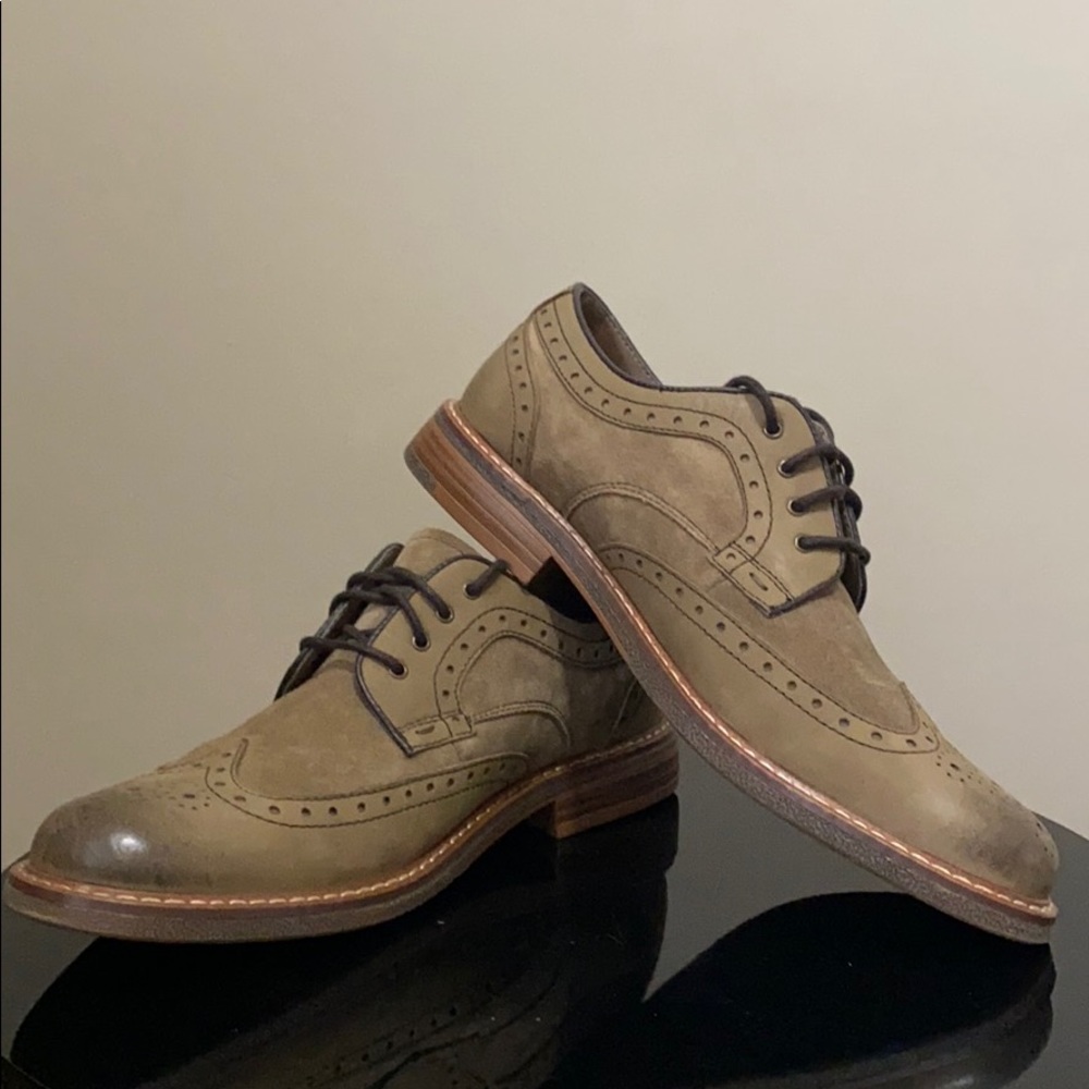 Tan wingtip shoes